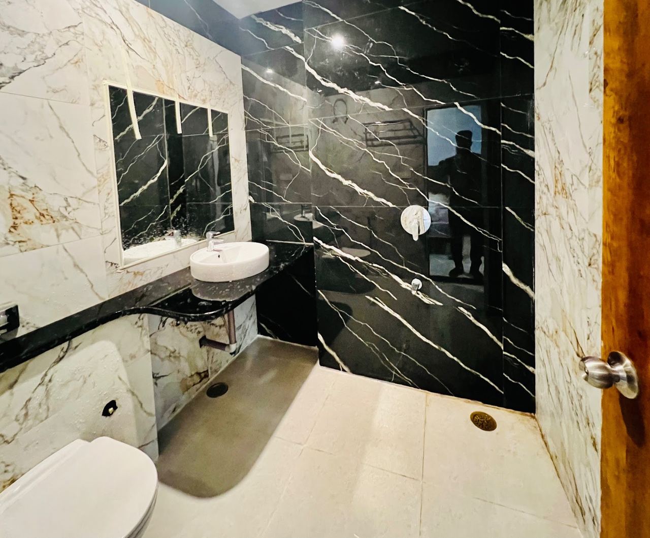 Attached washroom with pressure shower at Karol's Villa Girls PG, Malviya Nagar