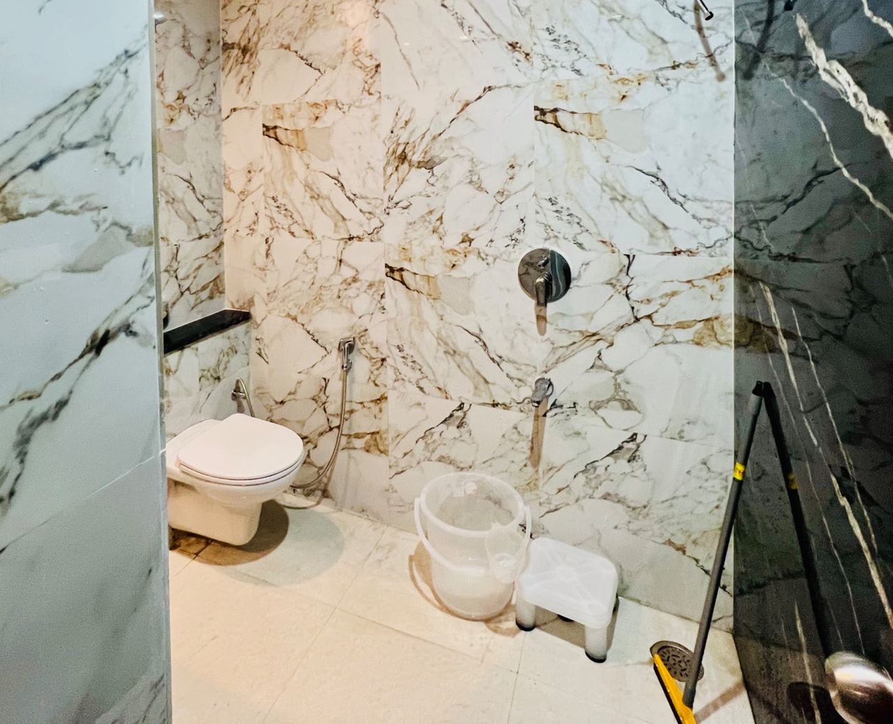 Attached washroom with pressure shower at Karol's Villa Girls PG, Malviya Nagar (photo 4)